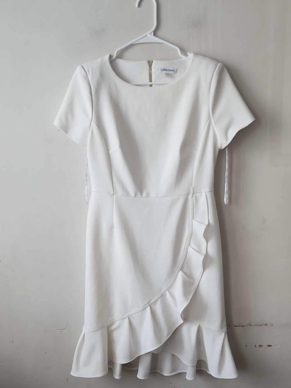 Calvin Klein White Short-Sleeve Ruffle Wrap Mini Dress. In Excellent Condition